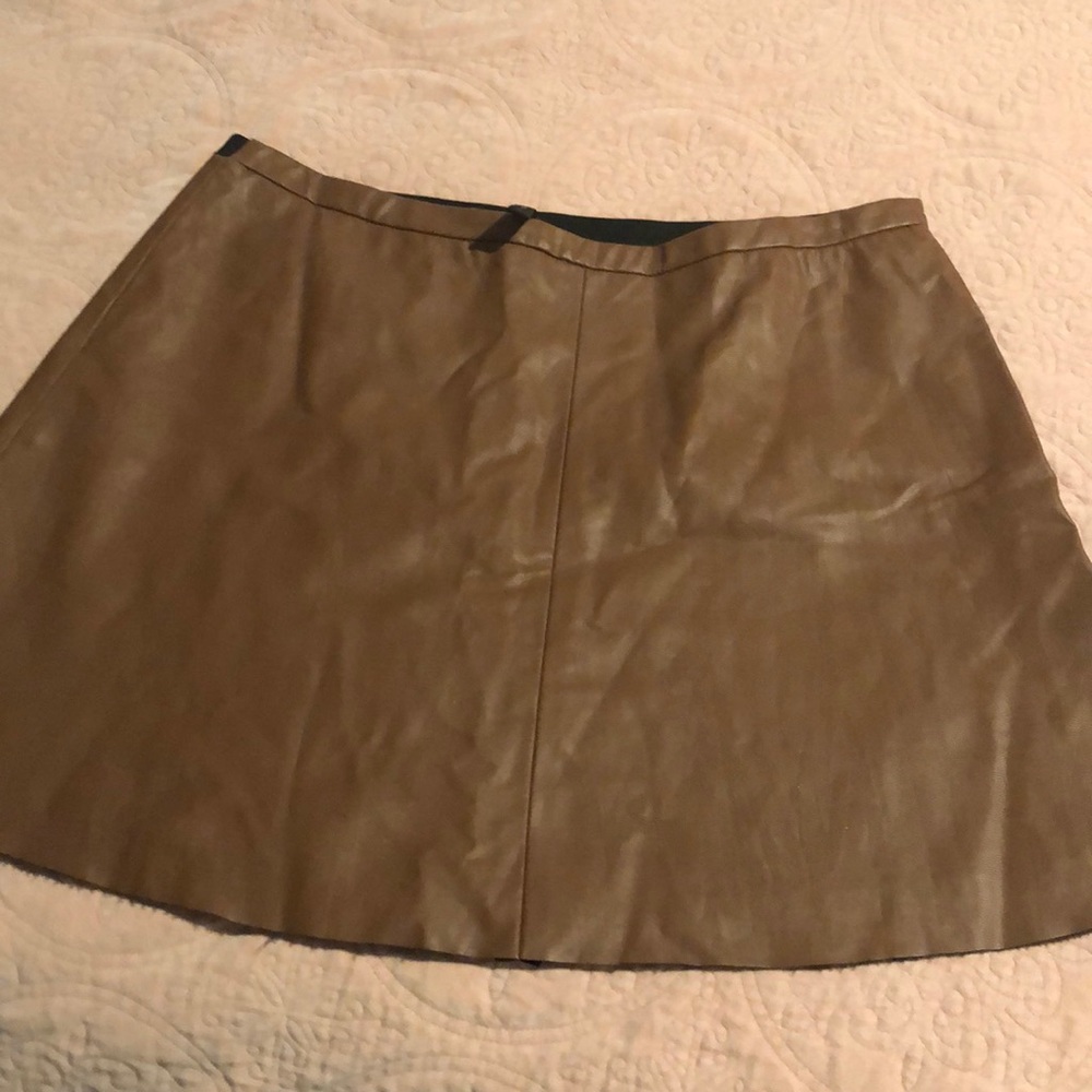 BCBG leather looking mini skirt. S